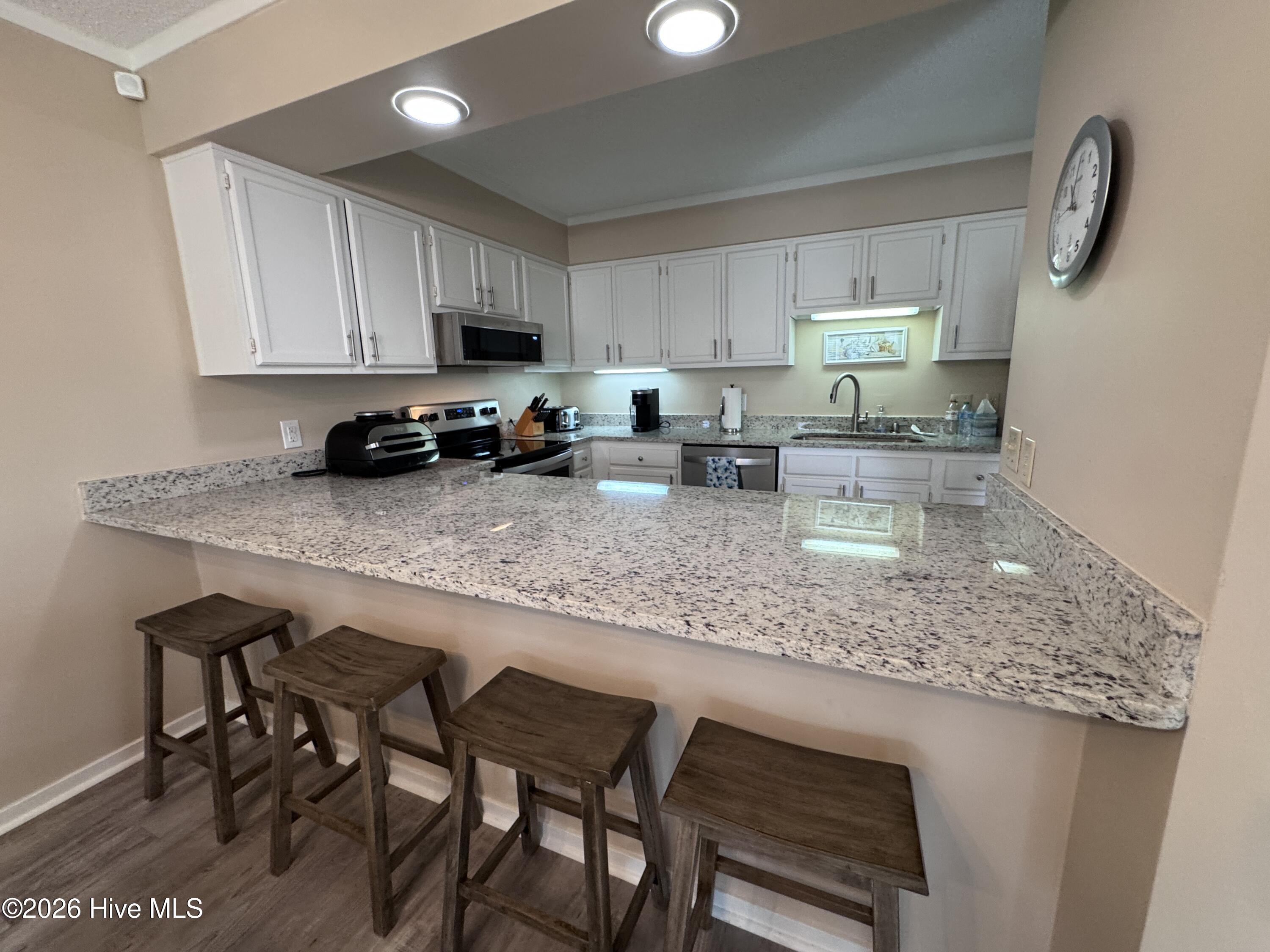 650 Salter Path Road, Unit 317 Pine Knoll Shores, NC 28512 - Photo 7 of 18 Kitchen (6)