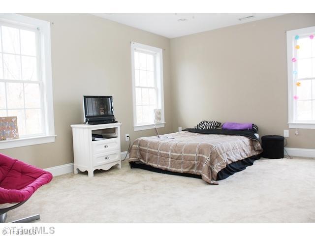 6909 Bowman Road Mebane, NC 27302 - Photo 8 of 16 1st Bedroom.