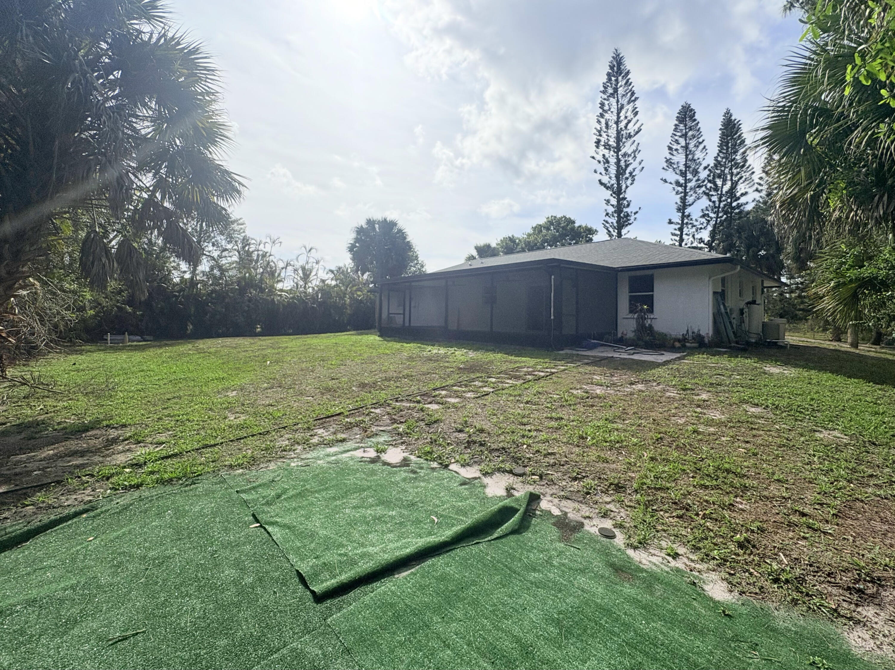 14523 Flamingo Road Loxahatchee Groves, FL 33470 - Photo 19 of 50 a view of a backyard