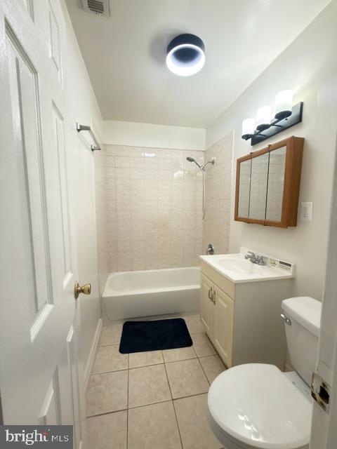 7135 Oak Ridge Road Falls Church, VA 22042 - Photo 22 of 41 a bathroom with a sink a toilet and shower