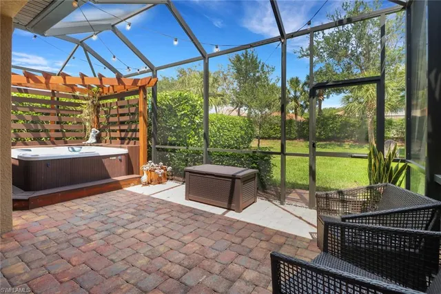 a view of a sitting area with furniture and garden