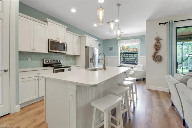 a view of an chairs and table in the patio