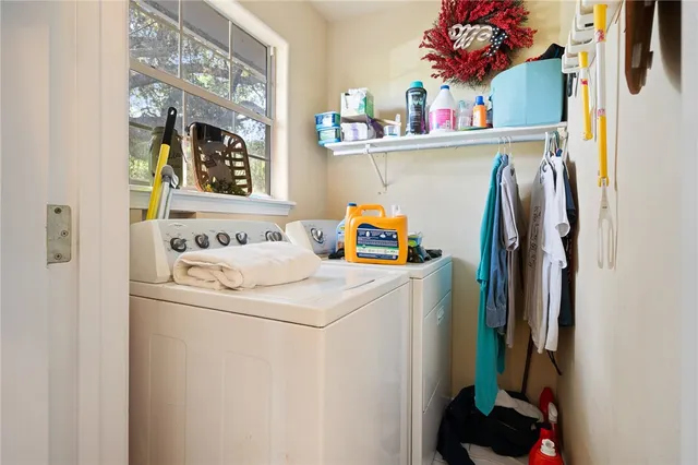 a utility room with dryer and washer