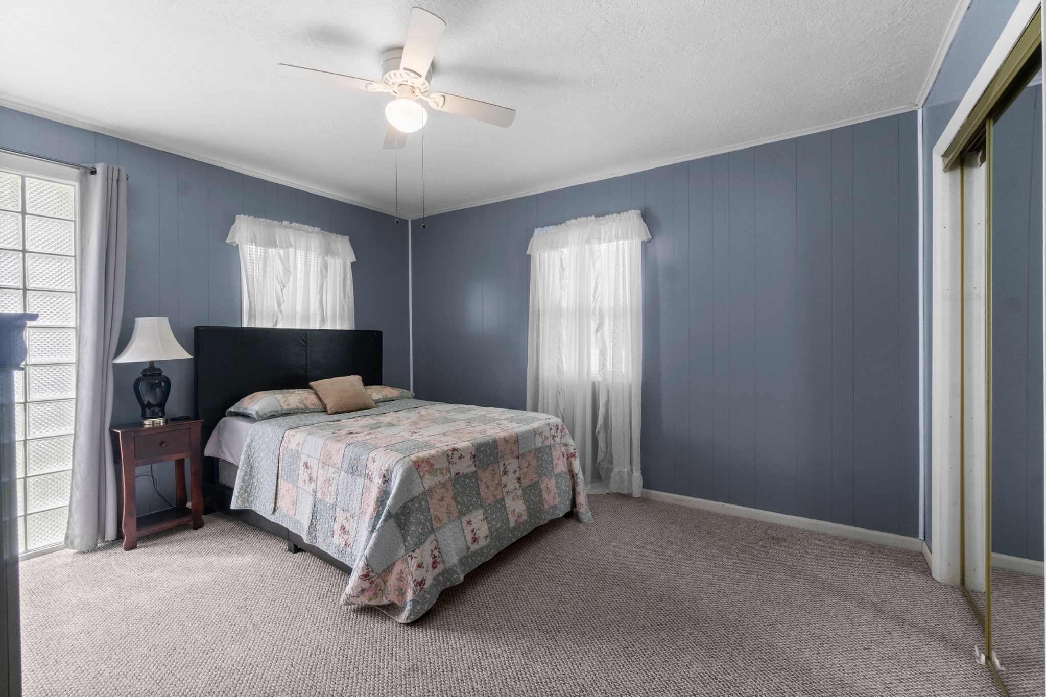21 Clearview Point Blank, TX 77364 - Photo 24 of 43 a bedroom with a bed and window