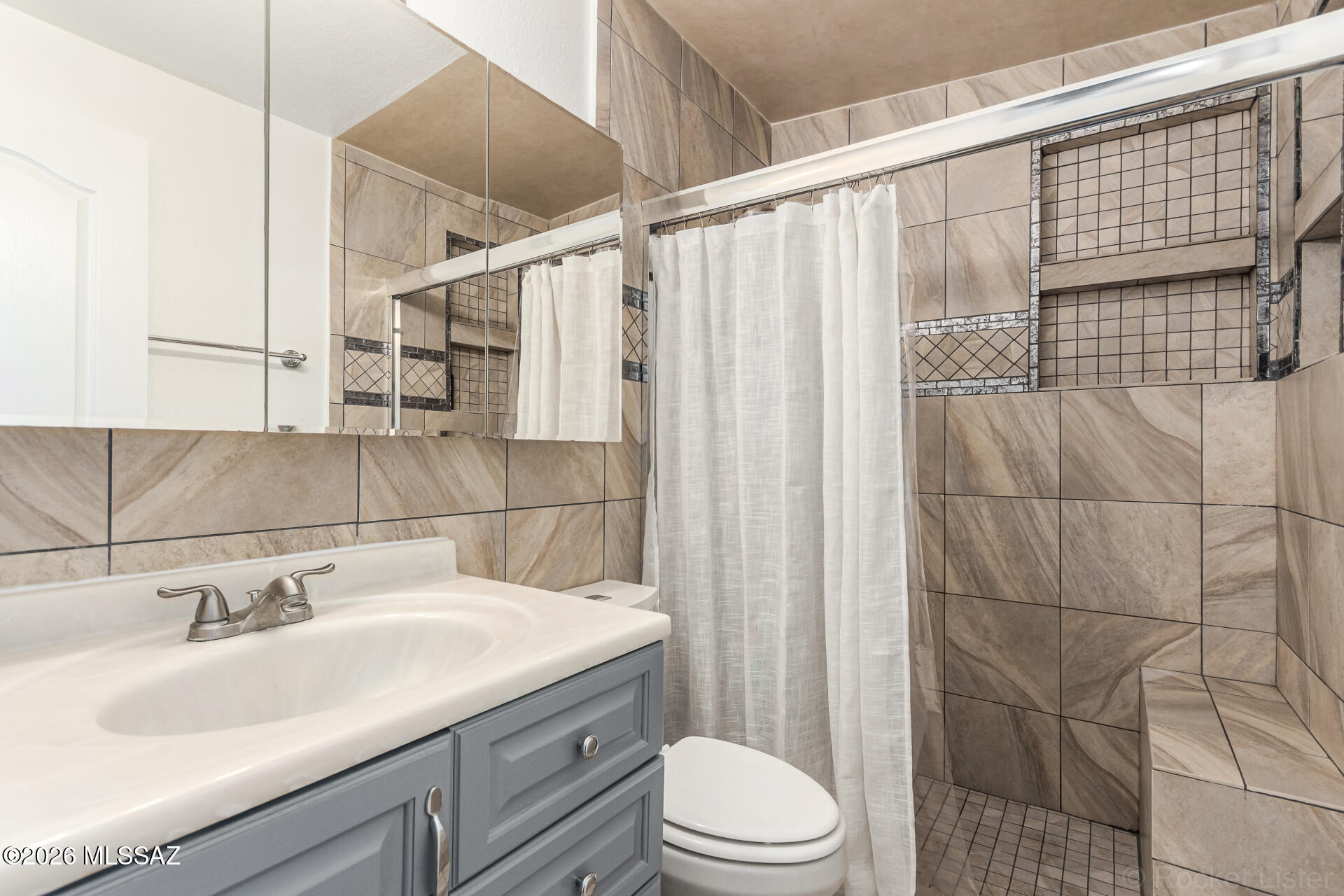 17 East Los Reales Road Tucson, AZ 85756 - Photo 14 of 27 a bathroom with a sink toilet and shower