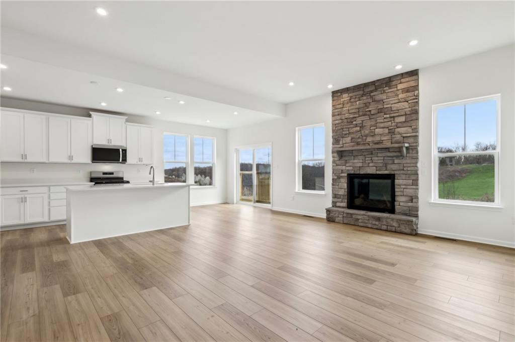 116 Fox Water Trail Beaver, PA 15009 - Photo 14 of 45 a view of kitchen with cabinets and wooden floor