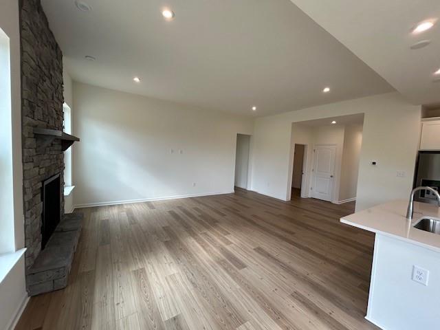 116 Fox Water Trail Beaver, PA 15009 - Photo 24 of 45 a view of empty room with wooden floor and fireplace
