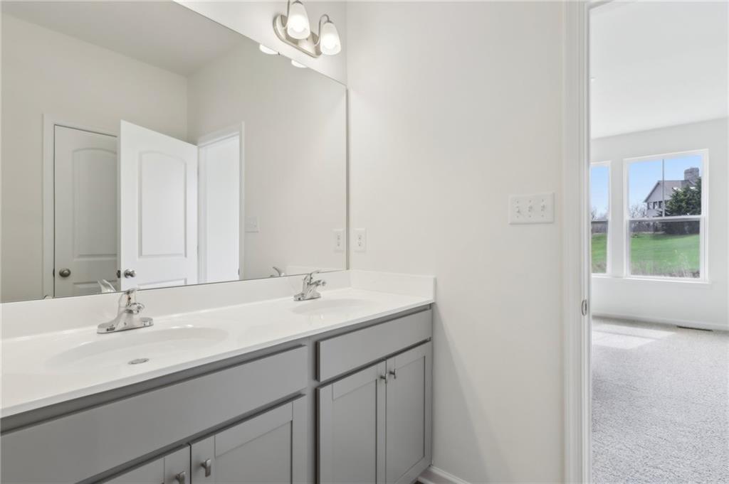 116 Fox Water Trail Beaver, PA 15009 - Photo 30 of 45 a bathroom with a sink double vanity and a mirror
