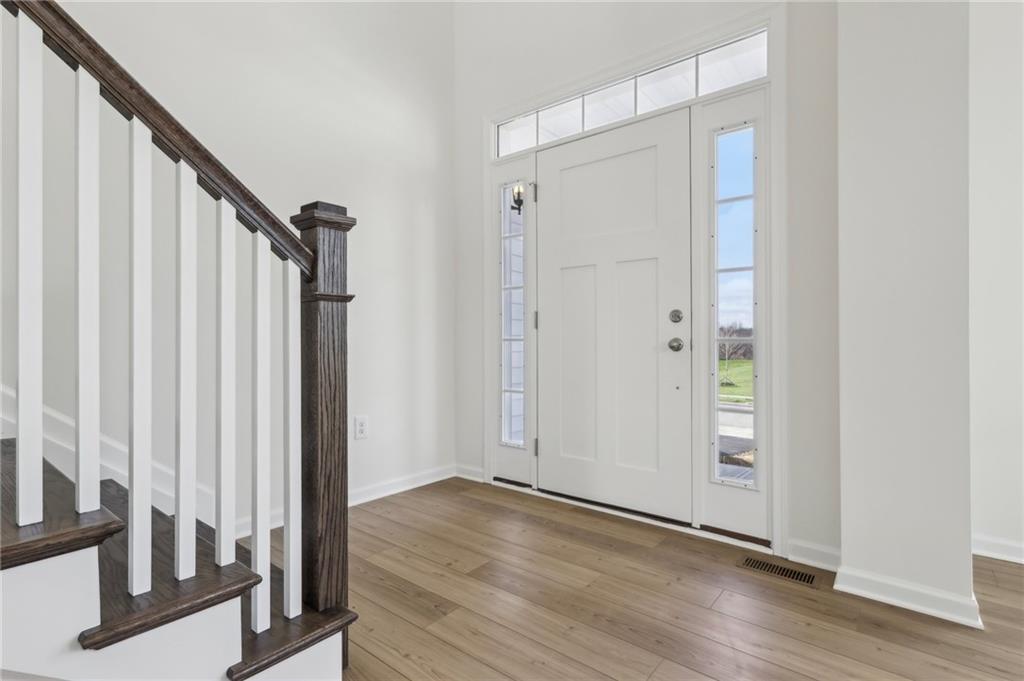 116 Fox Water Trail Beaver, PA 15009 - Photo 9 of 45 a view of a hallway with wooden floor and entryway