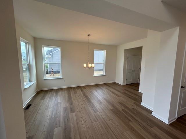 116 Fox Water Trail Beaver, PA 15009 - Photo 10 of 45 an empty room with wooden floor and windows