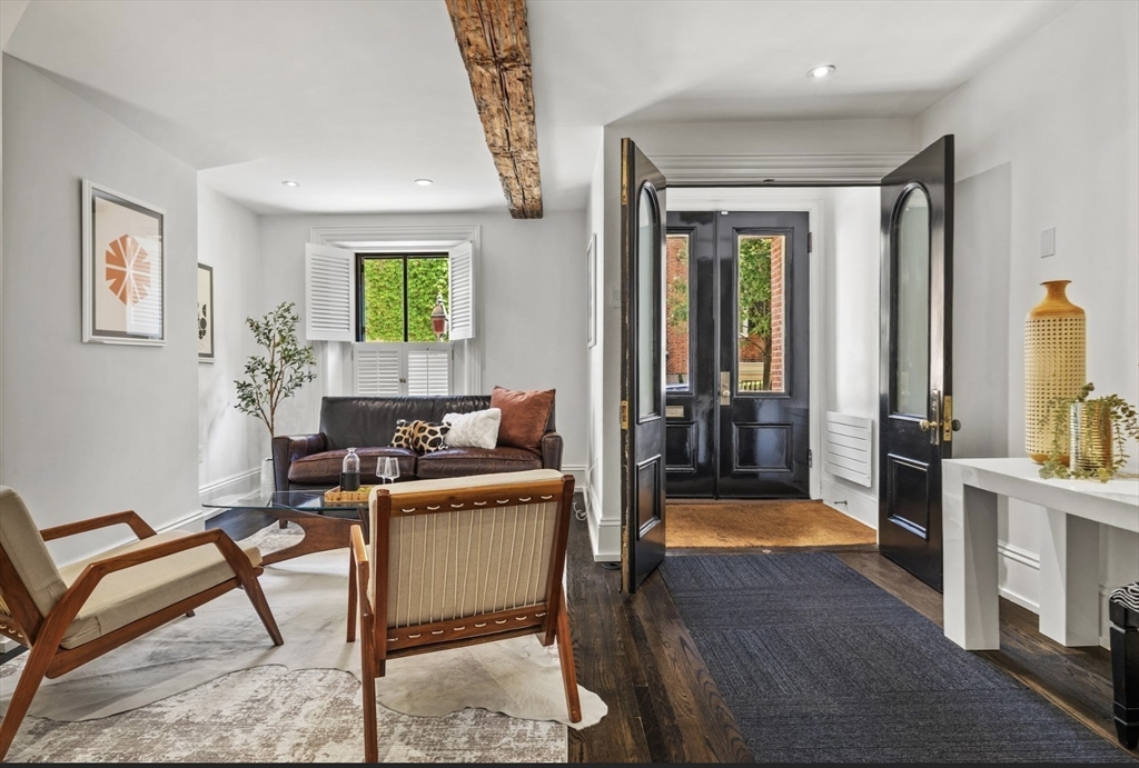 22 Joy Street Boston, MA 02114 - Photo 11 of 36 a living room with furniture and a window