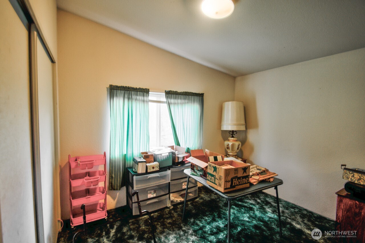 236 Tryon Road Onalaska, WA 98570 - Photo 16 of 40 a living room with furniture and a window
