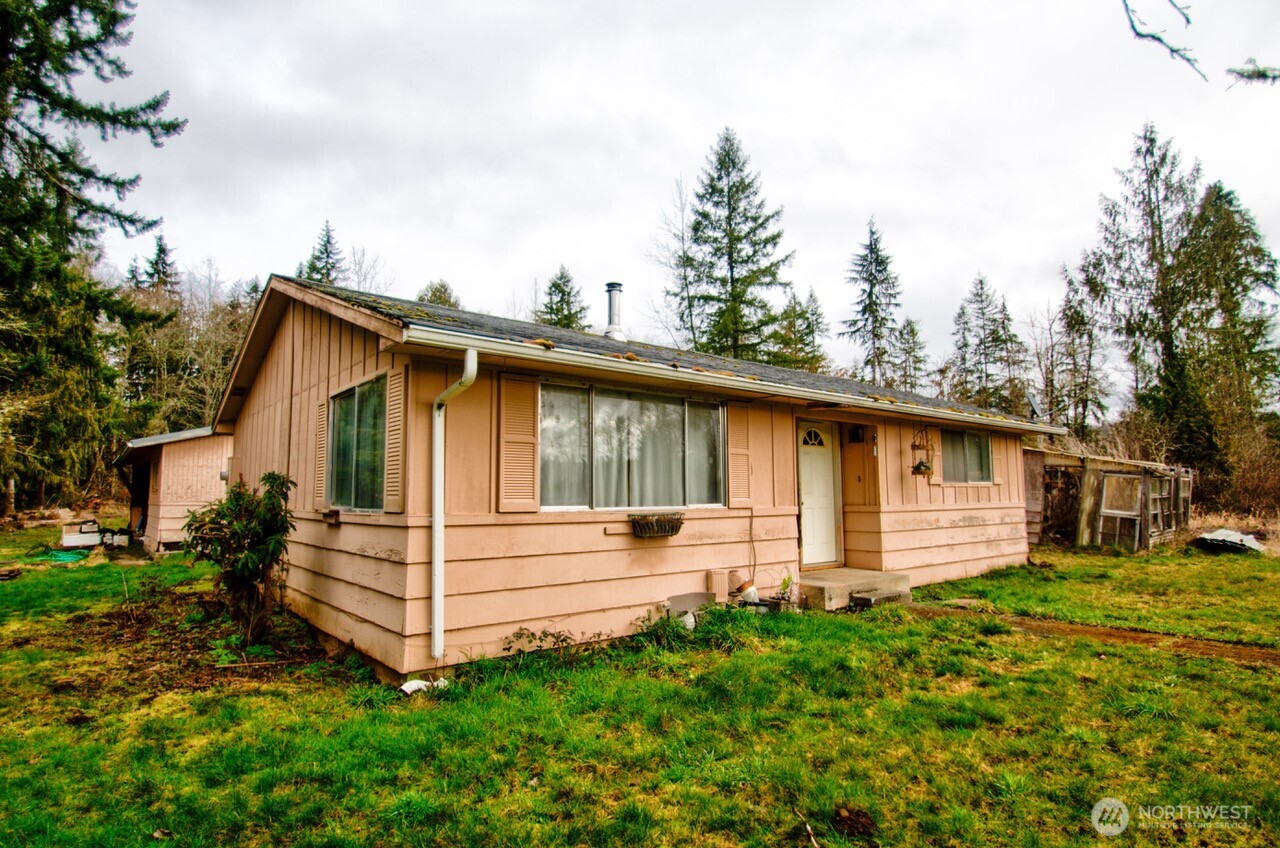 236 Tryon Road Onalaska, WA 98570 - Photo 24 of 40 a view of a house with a yard