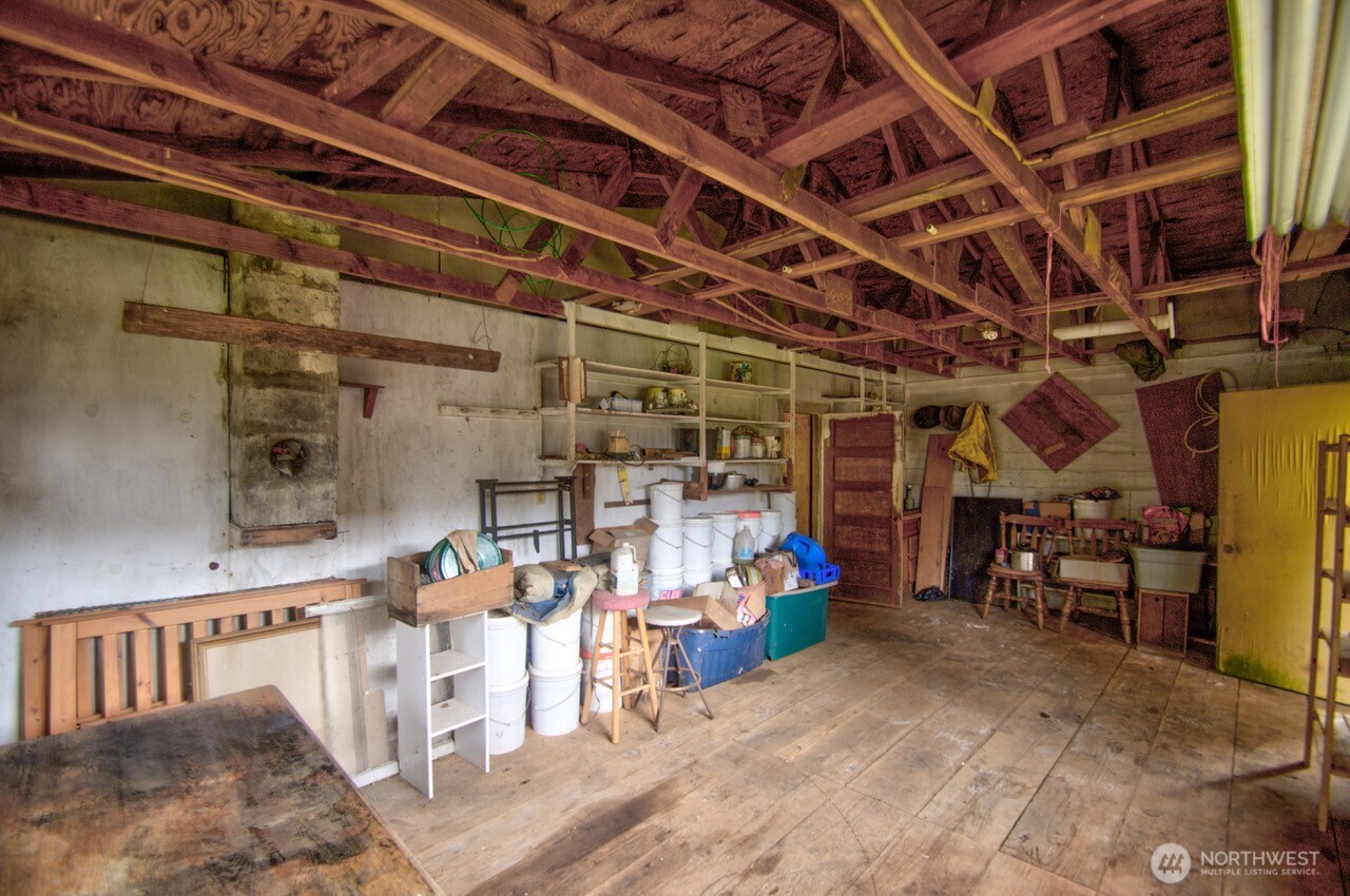 236 Tryon Road Onalaska, WA 98570 - Photo 32 of 40 a view of a room with wooden shelves