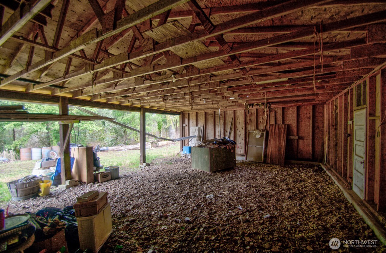 236 Tryon Road Onalaska, WA 98570 - Photo 33 of 40 a view of a backyard with table and chairs