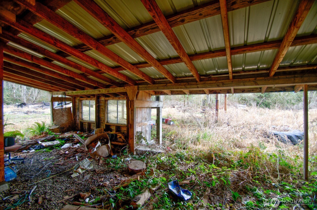 236 Tryon Road Onalaska, WA 98570 - Photo 34 of 40 a view of a room with wooden walls