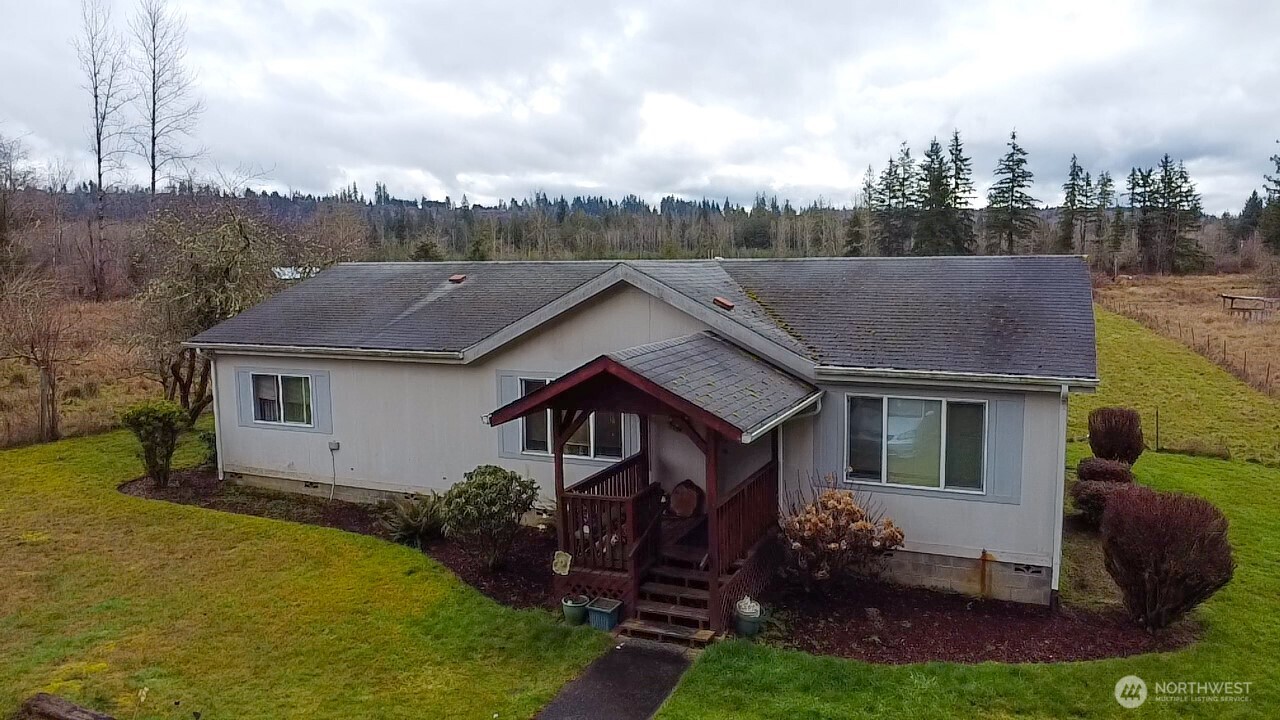 236 Tryon Road Onalaska, WA 98570 - Photo 8 of 40 a aerial view of a house next to a yard
