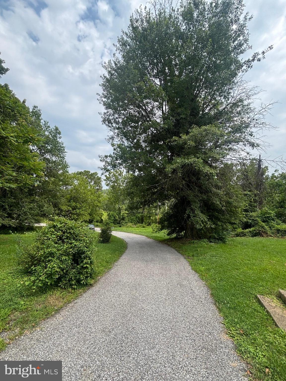 Downward angle of driveway in between 5808 & 5814