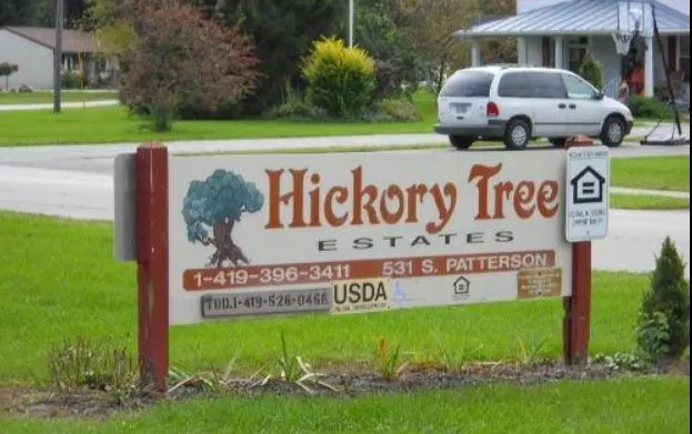 a sign on the side of the road