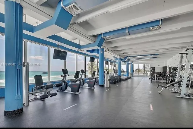 a very nice looking room with gym equipment