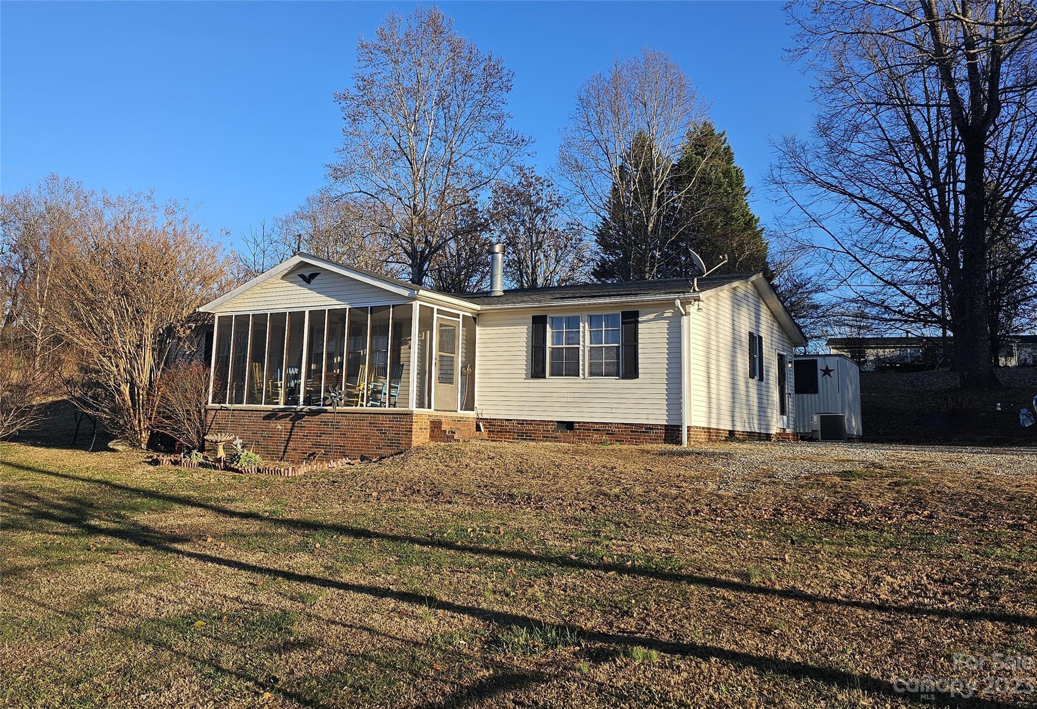 290 Long Street Rutherfordton, NC 28139 - Photo 1 of 23 a front view of a house with a garden