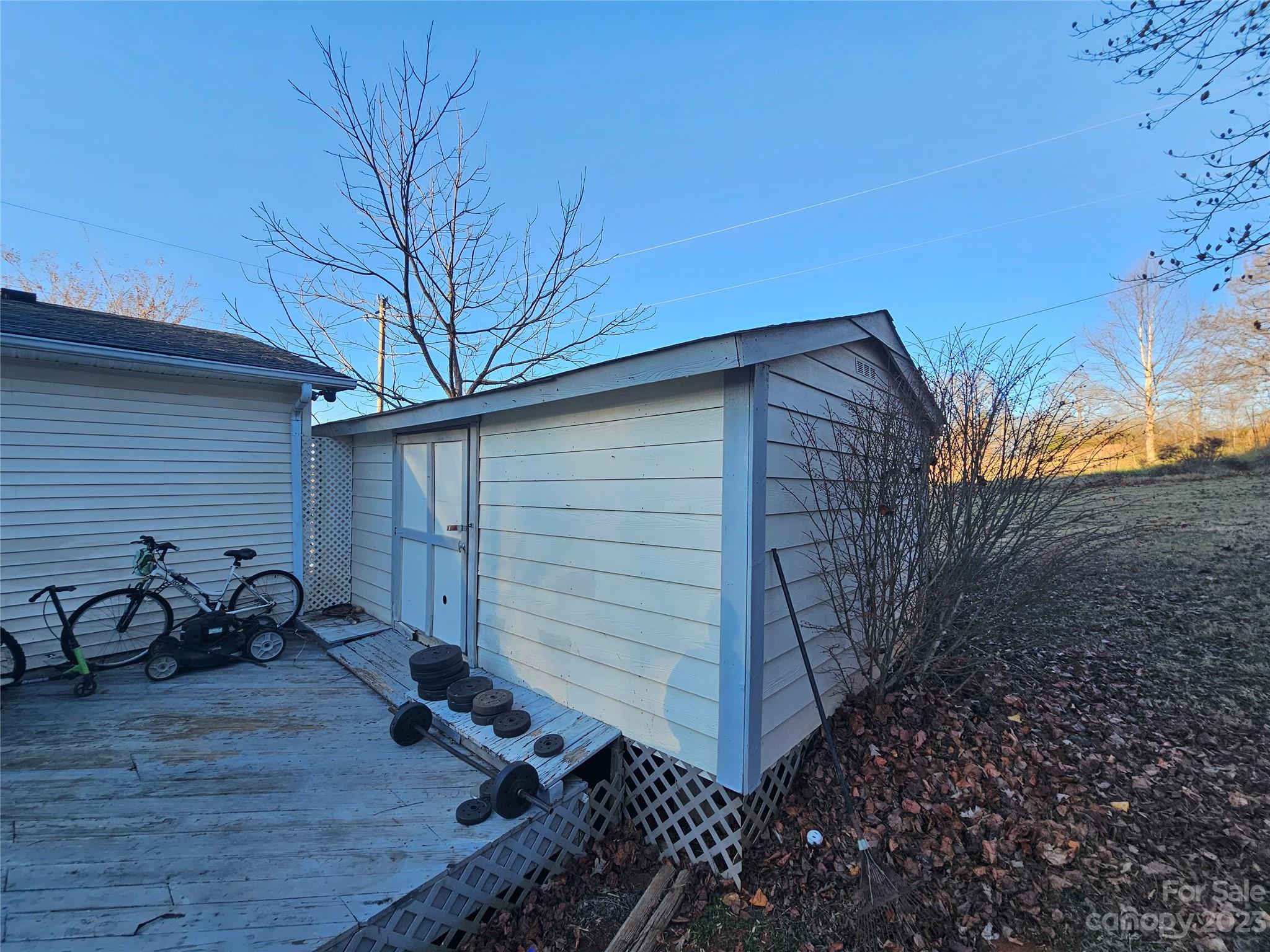 290 Long Street Rutherfordton, NC 28139 - Photo 22 of 23 a backyard of a house with table and chairs