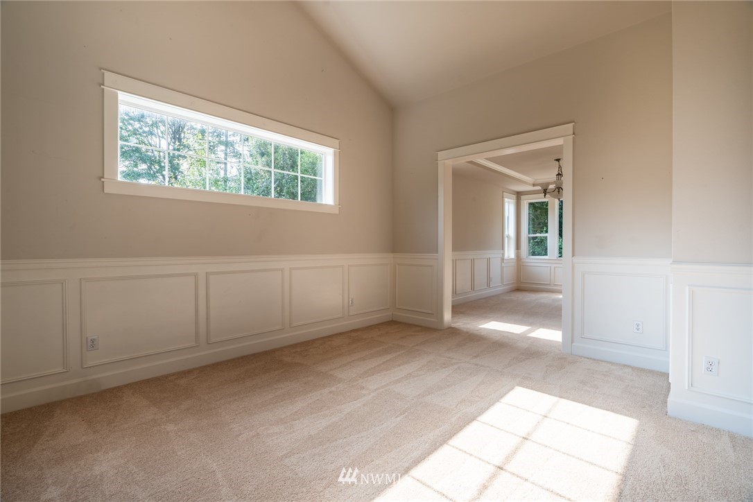 16228 Three Lakes Road Snohomish, WA 98290 - Photo 4 of 23 an empty room with windows