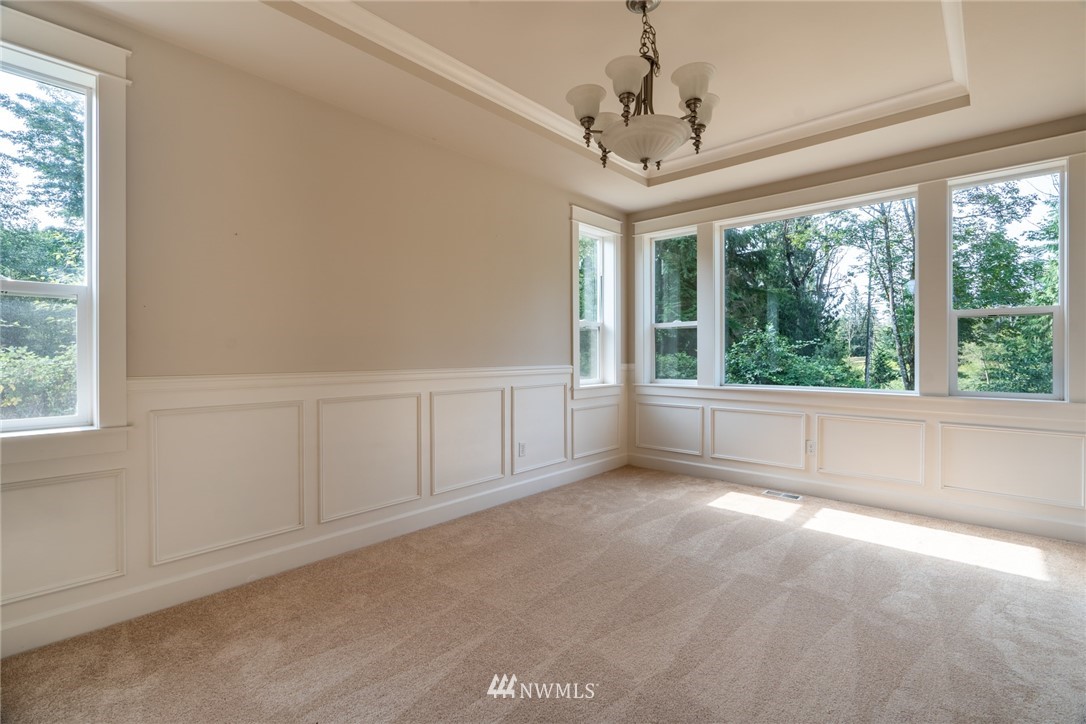 16228 Three Lakes Road Snohomish, WA 98290 - Photo 5 of 23 a view of an empty room with a window