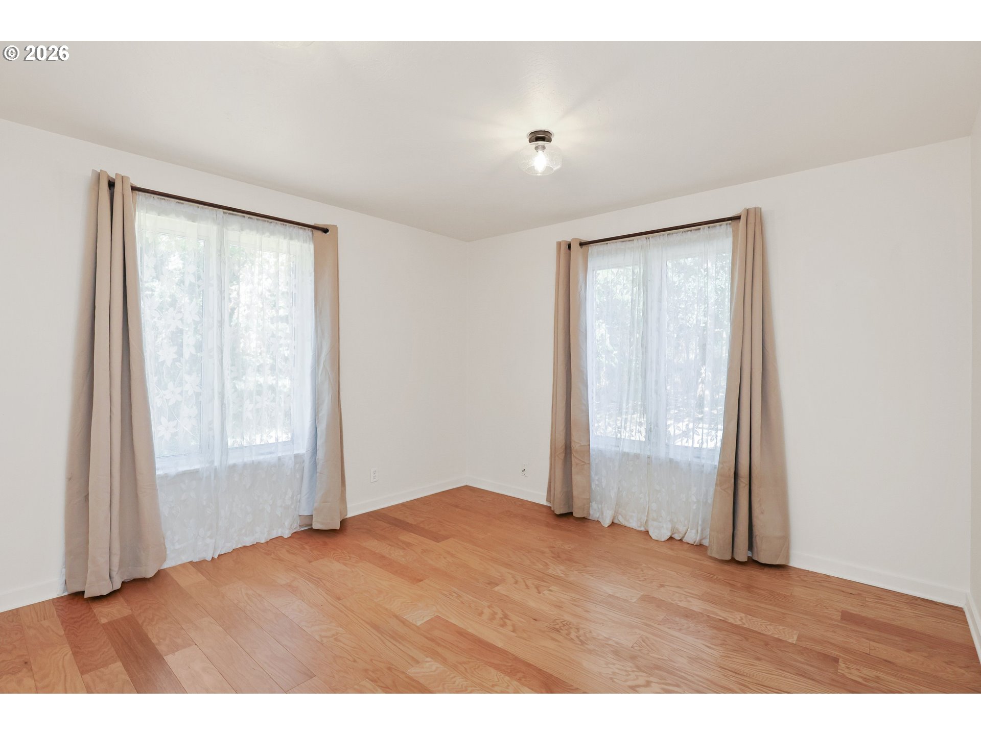 24496 McCain Road Monroe, OR 97456 - Photo 12 of 43 an empty room with windows and closet