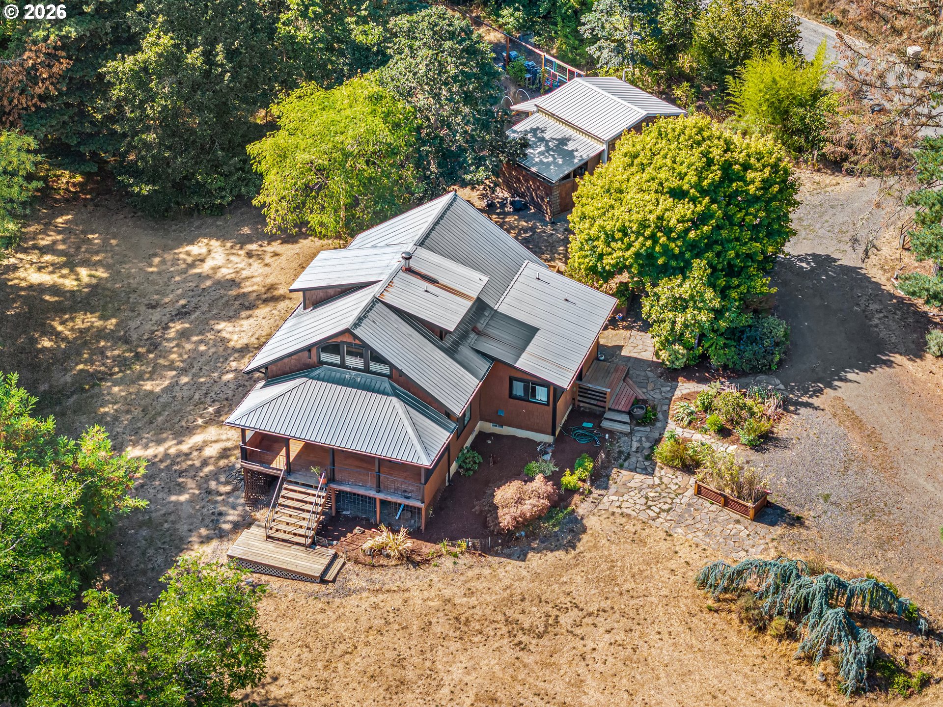 24496 McCain Road Monroe, OR 97456 - Photo 3 of 43 an aerial view of a house with a yard