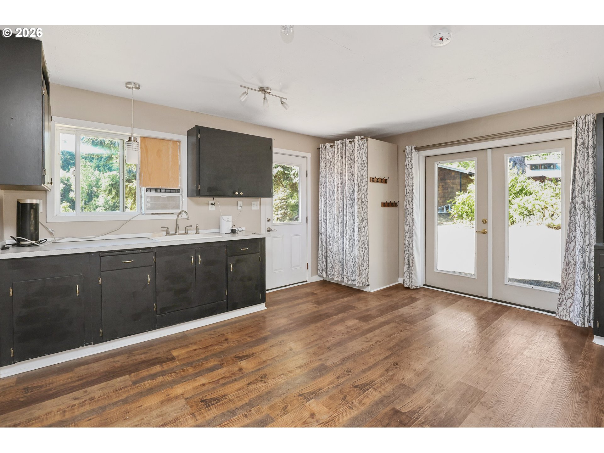 24496 McCain Road Monroe, OR 97456 - Photo 32 of 43 a kitchen with a sink and a large window