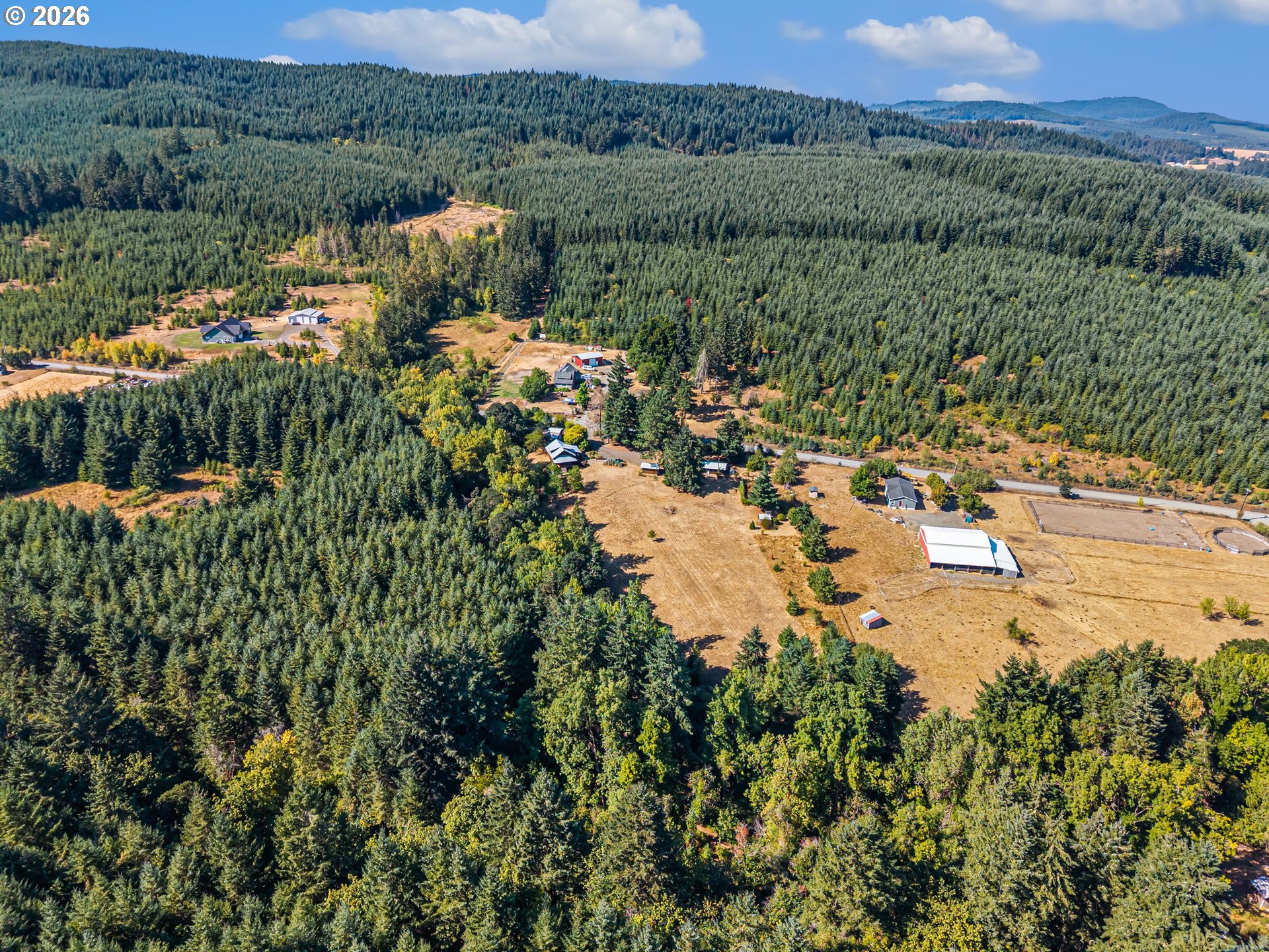 24496 McCain Road Monroe, OR 97456 - Photo 40 of 43 a view of a lake with a city