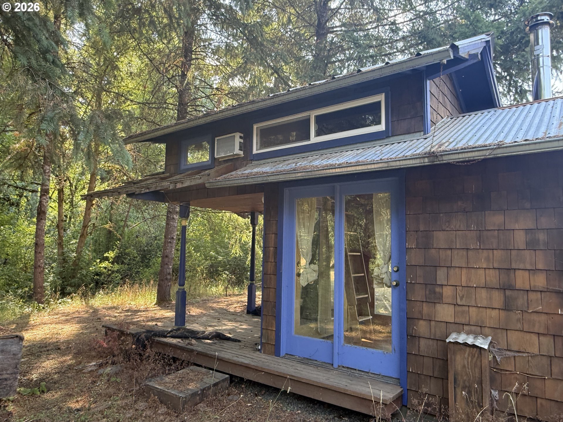 24496 McCain Road Monroe, OR 97456 - Photo 43 of 43 a view of a house with a large window