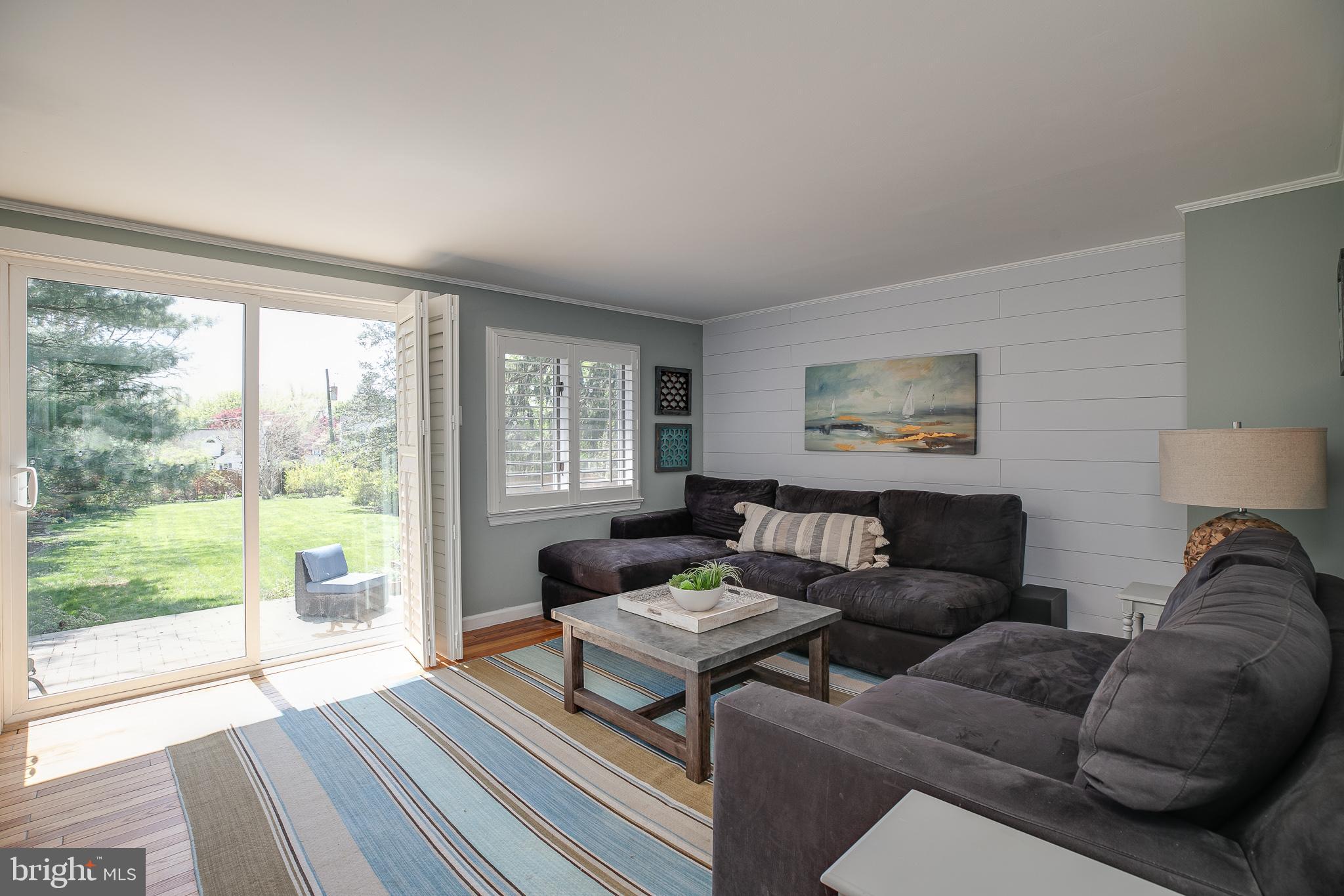 330 Old Lancaster Road Devon, PA 19333 - Photo 15 of 33 a living room with furniture and a large window
