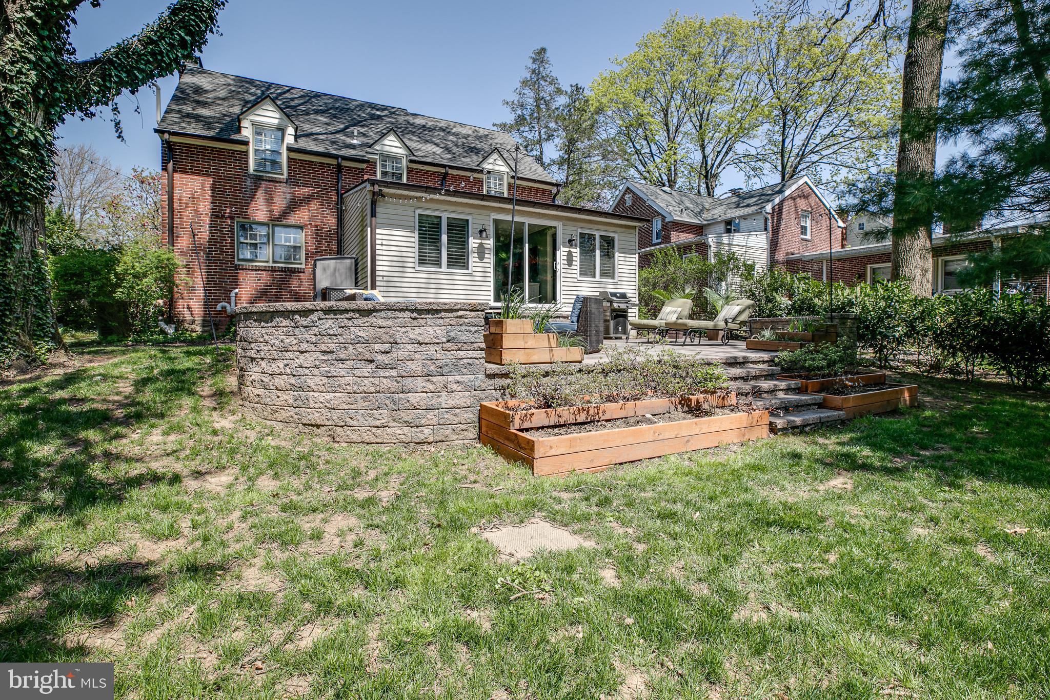 330 Old Lancaster Road Devon, PA 19333 - Photo 20 of 33 a view of a house with swimming pool and sitting area