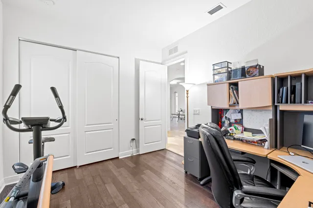 a view of backyard with outdoor seating and barbeque oven