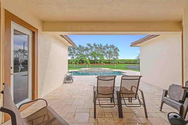 a view of a house with a swimming pool
