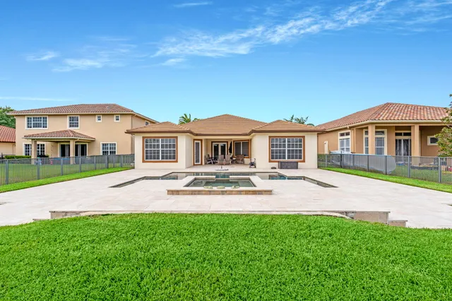 a house with garden in front of it