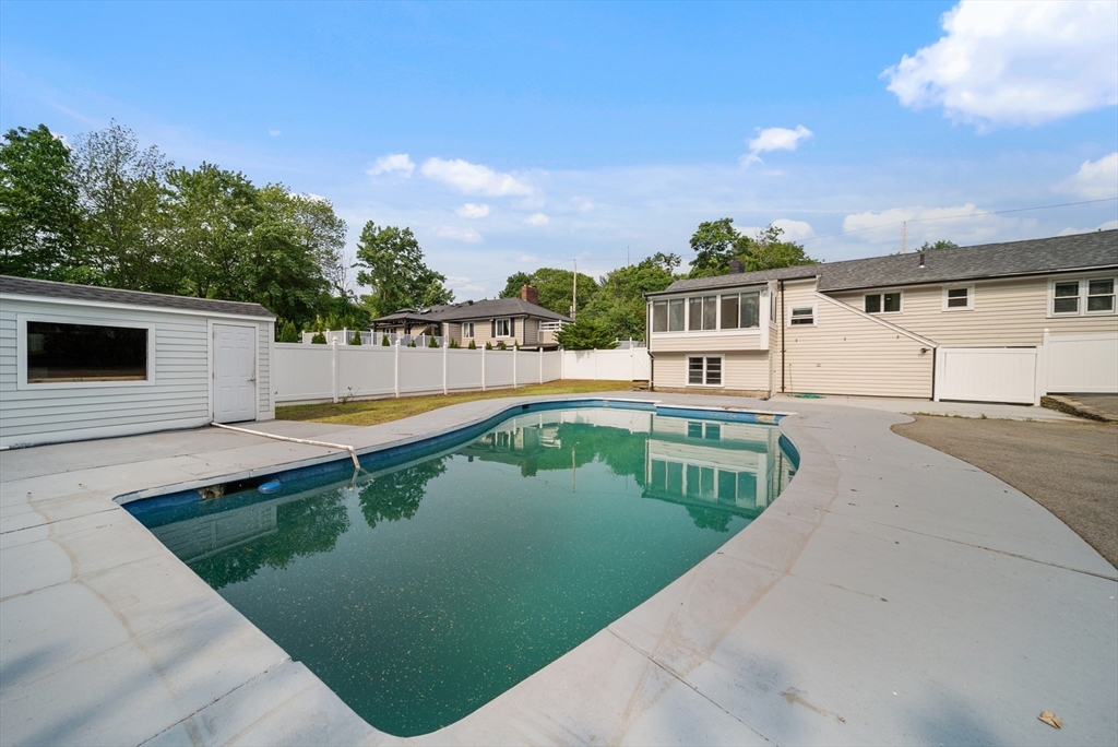 123 Walnut Street Saugus, MA 01906 - Photo 35 of 38 a view of a house with a swimming pool