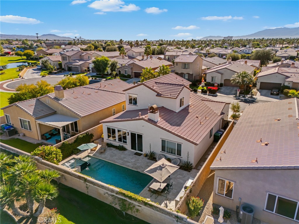 84146 Olona Court Indio, CA 92203 - Photo 33 of 35 an aerial view of residential houses with city view
