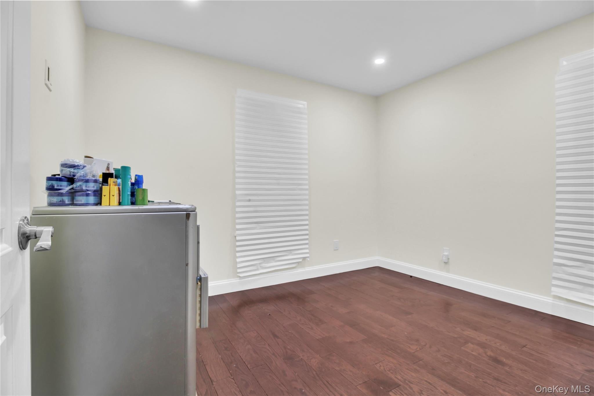 858 Prescott Street Valley Stream, NY 11580 - Photo 21 of 48 Unfurnished office with dark wood-style flooring and recessed lighting
