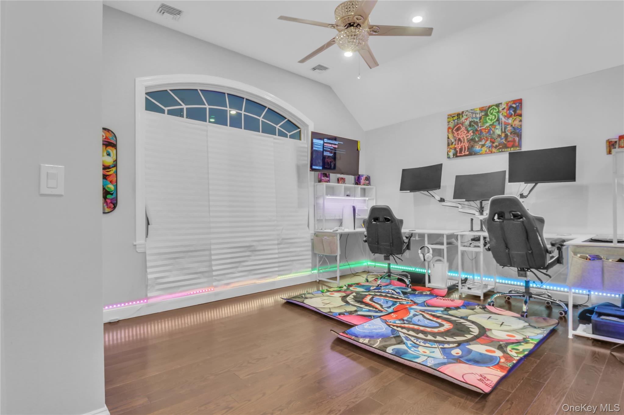 858 Prescott Street Valley Stream, NY 11580 - Photo 23 of 48 Home office featuring wood finished floors, lofted ceiling, and a ceiling fan