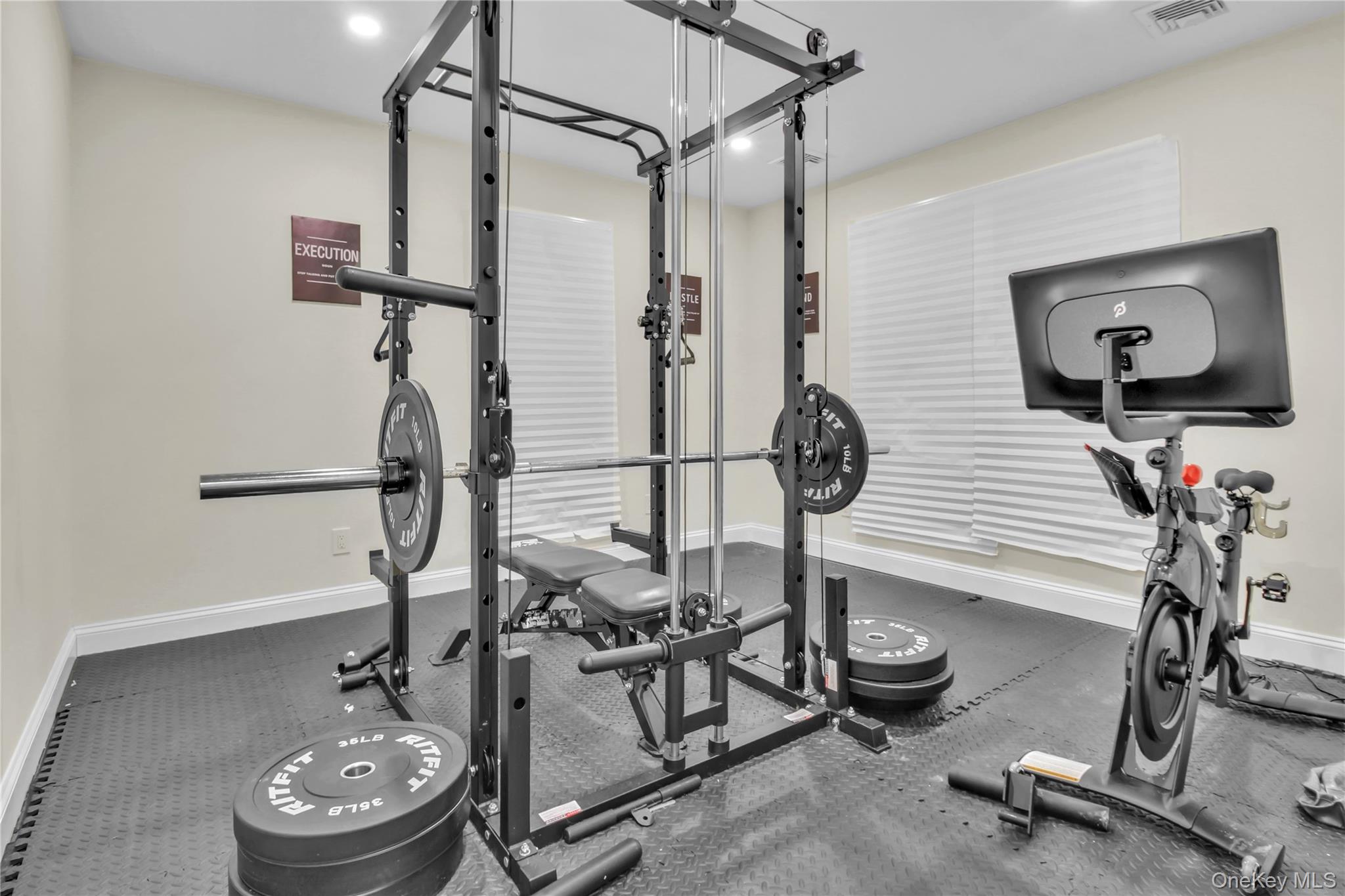 858 Prescott Street Valley Stream, NY 11580 - Photo 25 of 48 Exercise area featuring rubber floors and recessed lighting