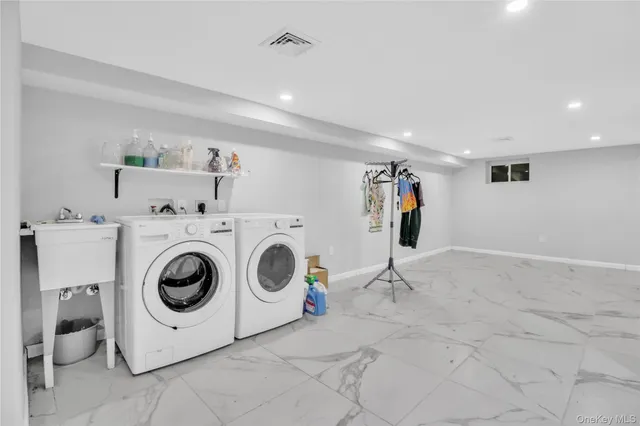 a view of road and car parked in front of house