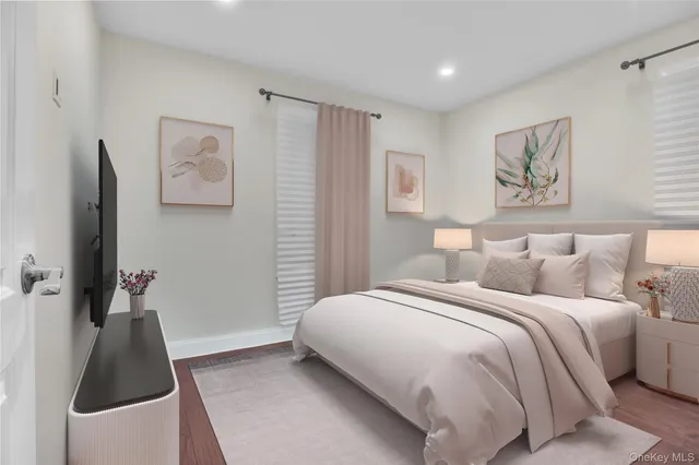 a bedroom with a bed and a view of bathroom