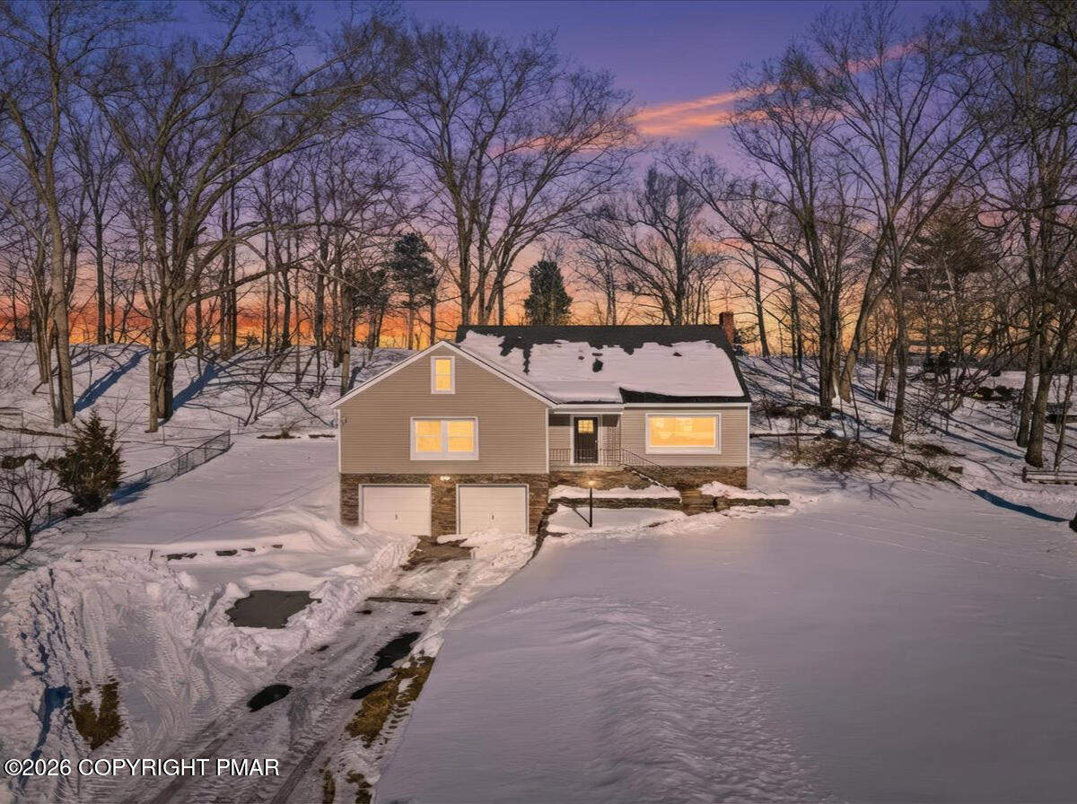 230 Colbert Street Stroudsburg, PA 18360 - Photo 2 of 43 a tall house with a large tree in front of it