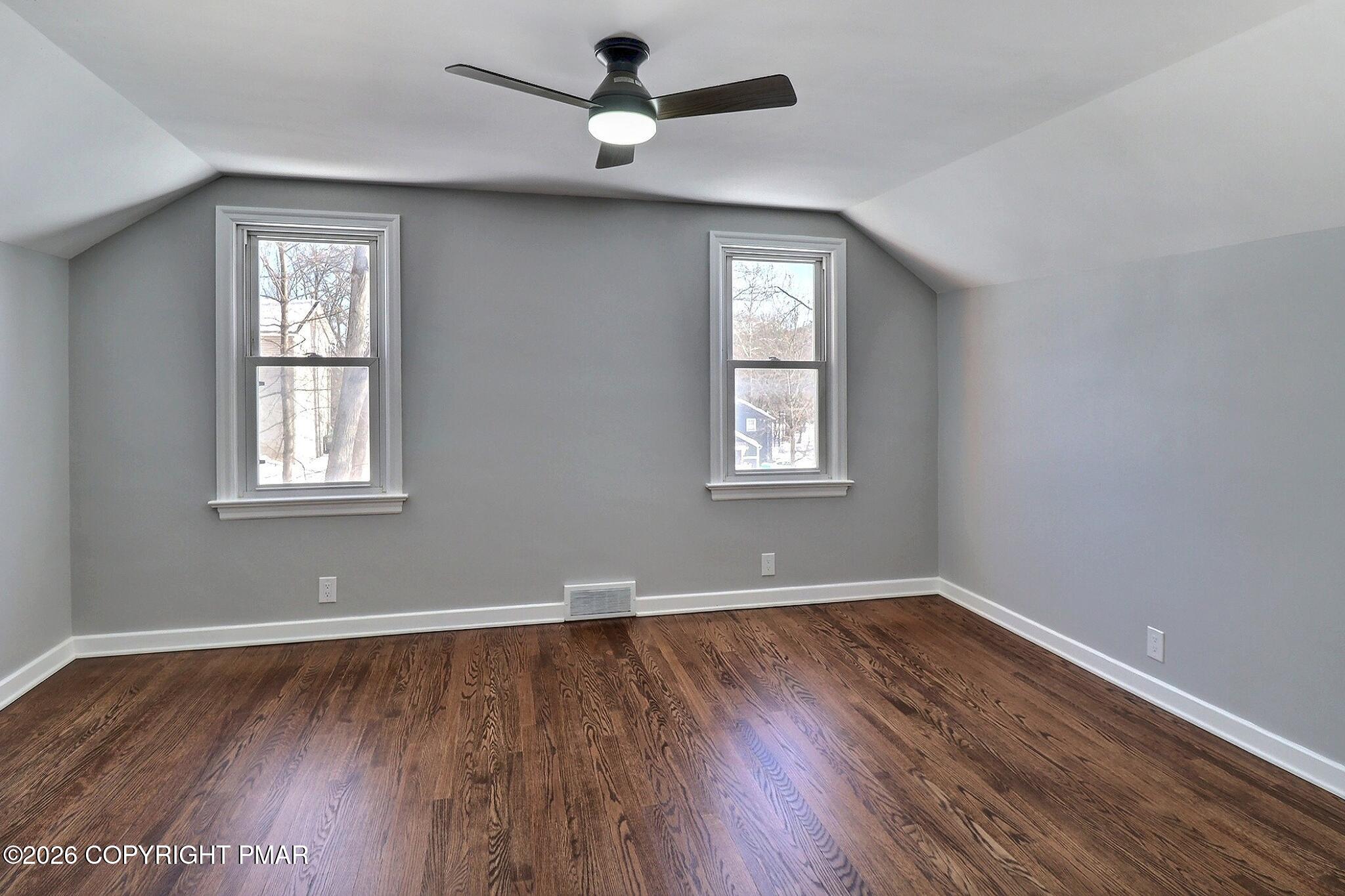 230 Colbert Street Stroudsburg, PA 18360 - Photo 31 of 43 a view of an empty room with wooden floor and a window