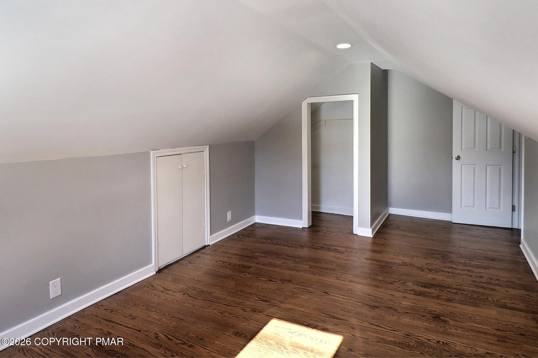 230 Colbert Street Stroudsburg, PA 18360 - Photo 36 of 43 a view of an empty room with wooden floor and closet