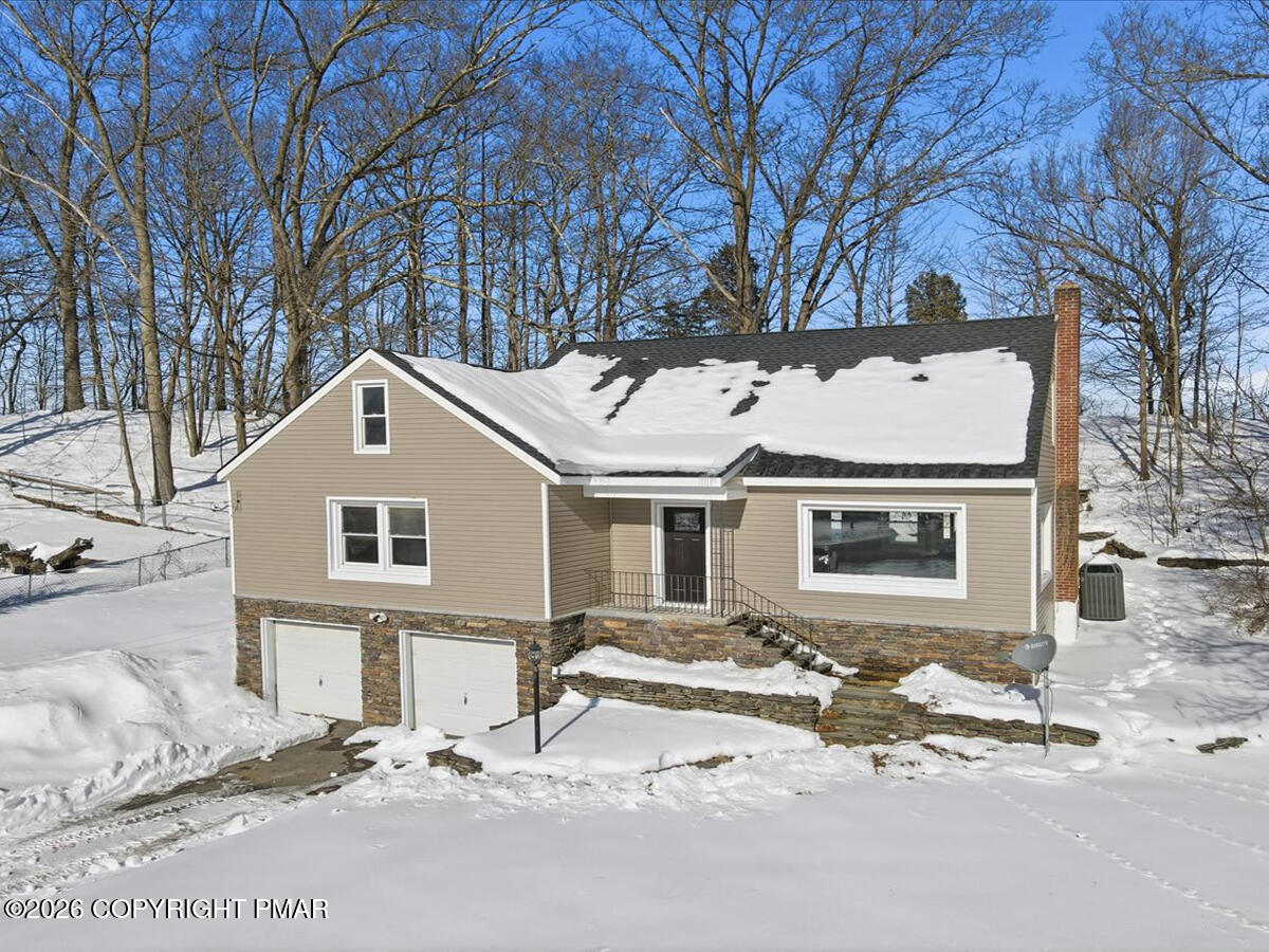 230 Colbert Street Stroudsburg, PA 18360 - Photo 41 of 43 a front view of a house with a yard