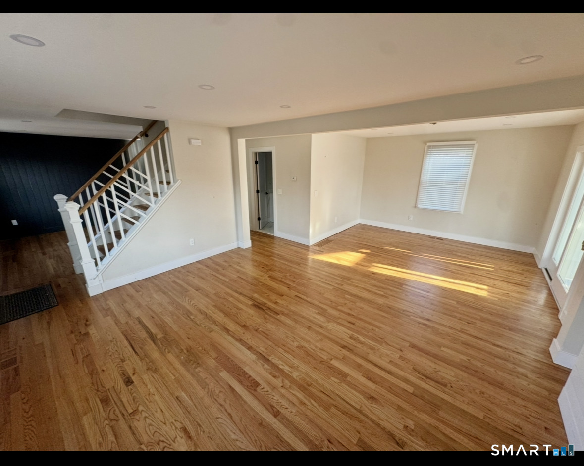 35 Knapps Highway Fairfield, CT 06825 - Photo 5 of 21 a view of empty room with wooden floor